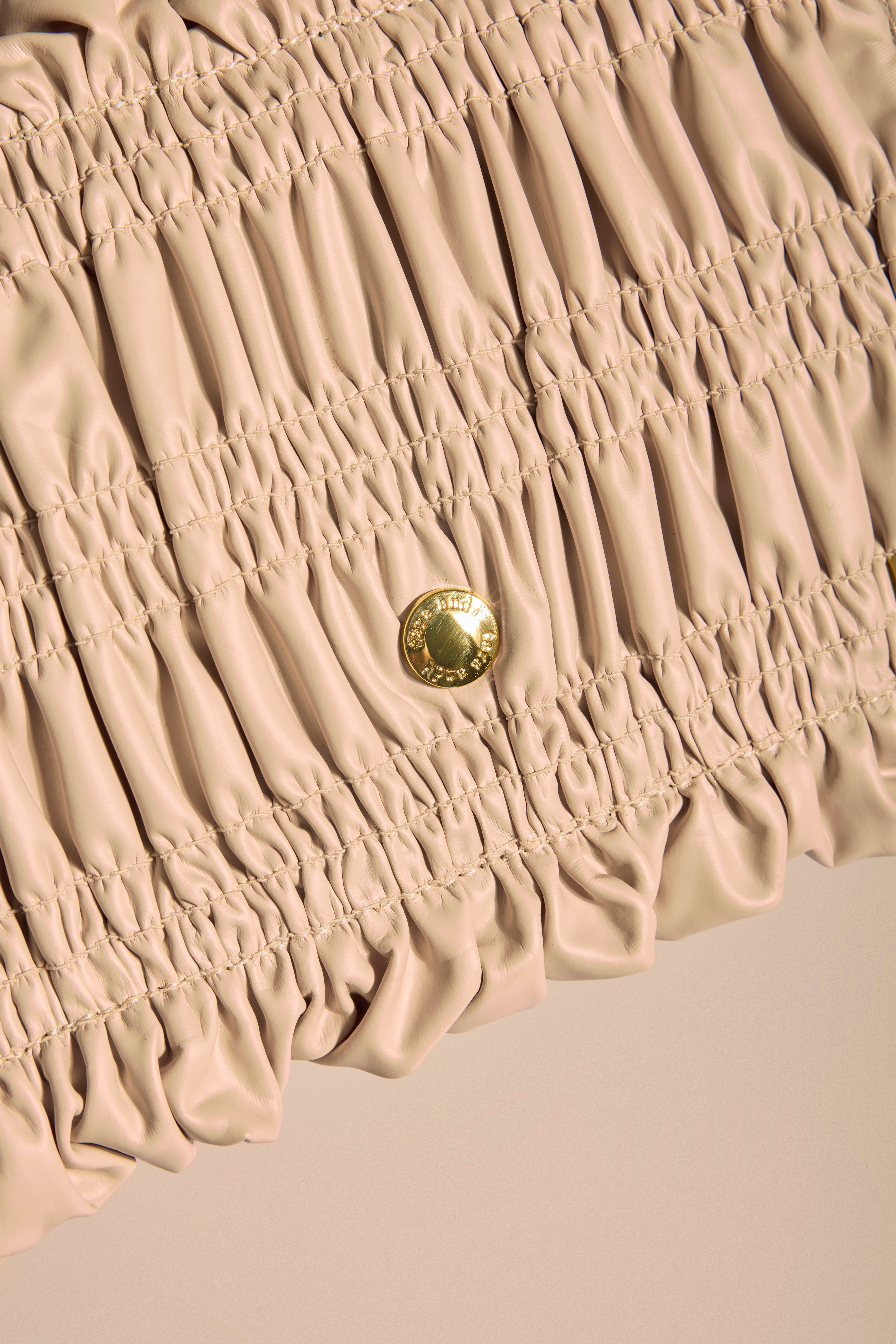 Crème Drift Sling Bag